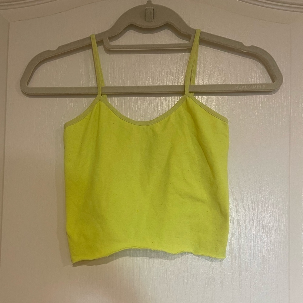 dELiA’s neon yellow cropped tank top​​​​​​​